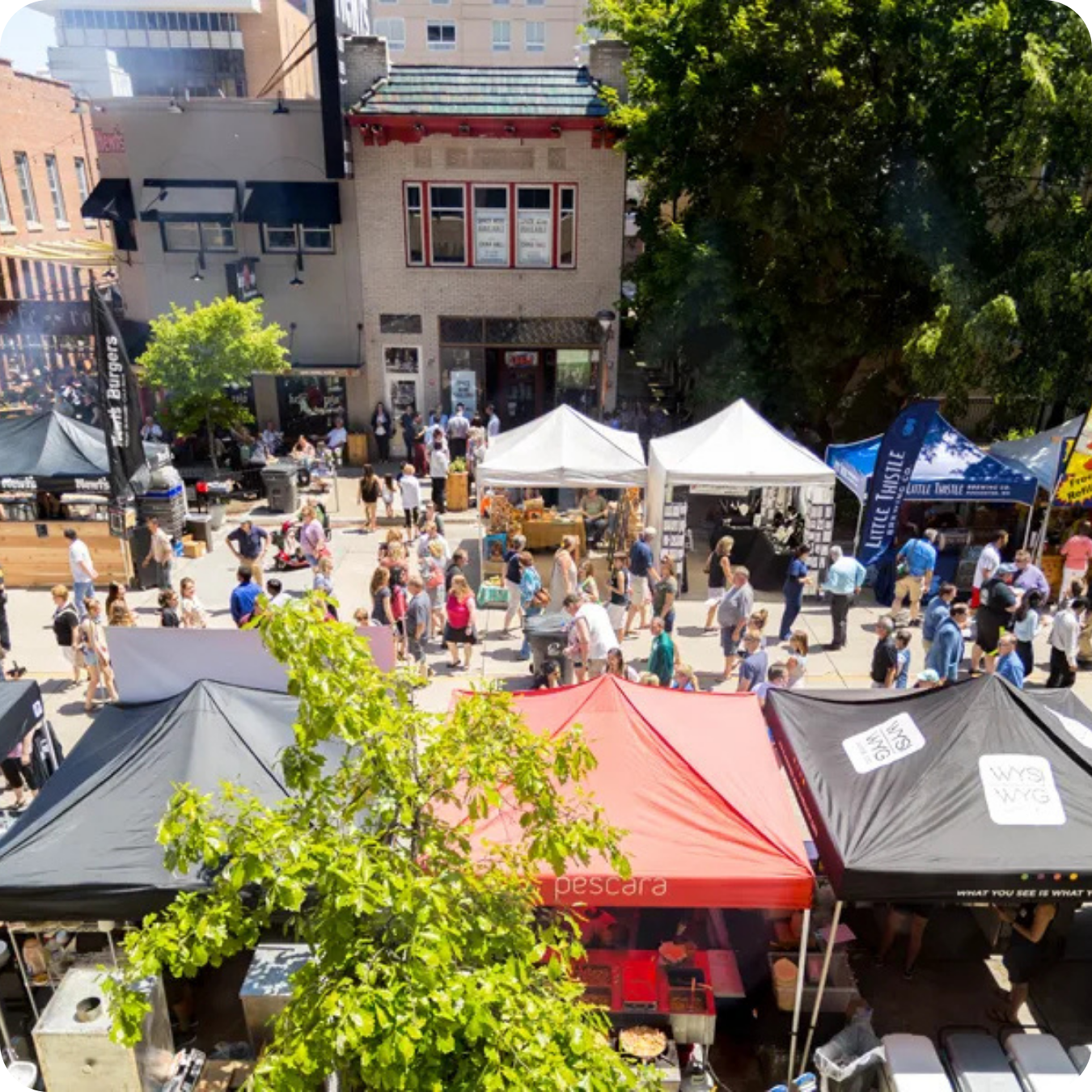 People at an outdoor street festival in Rochester MN
